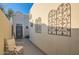 Inviting courtyard entry featuring a seating area and architectural details at 6411 S River Dr # 47, Tempe, AZ 85283