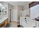 Clean bathroom featuring a soaking tub and shower at 9348 E Grandview St, Mesa, AZ 85207