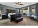 Spacious primary bedroom with large windows and sitting area at 9348 E Grandview St, Mesa, AZ 85207