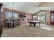 Game room featuring a pool table and brick feature wall at 9348 E Grandview St, Mesa, AZ 85207