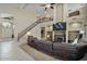 Spacious living room with a fireplace and high ceilings at 9348 E Grandview St, Mesa, AZ 85207