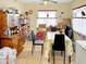 Bright dining area with table and chairs, and storage at 957 W Lindbergh Ave, Coolidge, AZ 85128