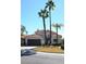 Beautiful two-story home with tile roof and desert landscaping at 9573 E Dreyfus Pl, Scottsdale, AZ 85260