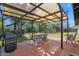 Relaxing patio area with pergola, seating, and a built-in grill at 9843 N 5Th Ave, Phoenix, AZ 85021