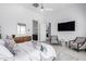 Main bedroom with sitting area and access to private bathroom at 12451 E Troon Vista Dr, Scottsdale, AZ 85255
