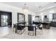 Sophisticated dining area with modern chandelier and stylish furnishings at 12451 E Troon Vista Dr, Scottsdale, AZ 85255