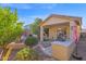 Outdoor patio with seating area and built-in grill at 142 W Hawk Way, Chandler, AZ 85286