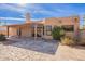 Home exterior showcasing a flagstone patio and covered patio at 14637 N Olympic Way, Fountain Hills, AZ 85268