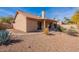 Desert landscaping with flagstone patio and covered patio at 14637 N Olympic Way, Fountain Hills, AZ 85268