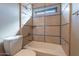Updated bathroom with tub/shower combo and tile surround at 14637 N Olympic Way, Fountain Hills, AZ 85268