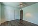 Bedroom with wood-look flooring and ample closet space at 14637 N Olympic Way, Fountain Hills, AZ 85268