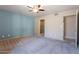 Spacious bedroom with carpeted floors and ceiling fan at 14637 N Olympic Way, Fountain Hills, AZ 85268