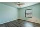 Bright bedroom featuring light walls and wood-look floors at 14637 N Olympic Way, Fountain Hills, AZ 85268