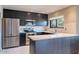 Modern kitchen with stainless steel appliances and ample counter space at 14637 N Olympic Way, Fountain Hills, AZ 85268