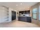 Modern kitchen with stainless steel appliances and corner shelving at 14637 N Olympic Way, Fountain Hills, AZ 85268