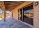 Covered patio with flagstone flooring and access to backyard at 14637 N Olympic Way, Fountain Hills, AZ 85268