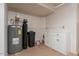 Utility room with water heater, water softener, and storage at 14637 N Olympic Way, Fountain Hills, AZ 85268