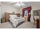 Bedroom with a queen bed and built-in shelving at 15225 N 100Th St # 1208, Scottsdale, AZ 85260