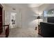 Home office with view into living room at 15225 N 100Th St # 1208, Scottsdale, AZ 85260