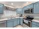 Well-equipped kitchen with stainless steel appliances and ample counter space at 15225 N 100Th St # 1208, Scottsdale, AZ 85260