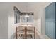 Cozy kitchenette with a small table and chairs at 15225 N 100Th St # 1208, Scottsdale, AZ 85260