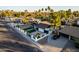 Aerial view of single-level home with updated exterior and landscaping at 1743 W Butler Dr, Phoenix, AZ 85021