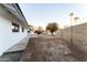 Spacious backyard with a large grassy area and block wall at 1743 W Butler Dr, Phoenix, AZ 85021