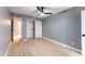Light-filled bedroom with spacious closet and wood-look floors at 1743 W Butler Dr, Phoenix, AZ 85021