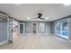 Open Gathering room with access to the kitchen and backyard pool at 1743 W Butler Dr, Phoenix, AZ 85021