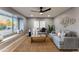 Bright living room with a cozy seating area and large window at 1743 W Butler Dr, Phoenix, AZ 85021