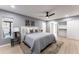 Main bedroom with a plush bed and ample closet space at 1743 W Butler Dr, Phoenix, AZ 85021