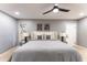 Main bedroom with a large bed and gray color scheme at 1743 W Butler Dr, Phoenix, AZ 85021