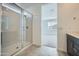 Modern bathroom with glass-enclosed shower and sleek vanity offers a spa-like experience at 17603 W Superior Ave, Goodyear, AZ 85338