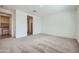 Spacious bedroom with neutral carpet and light walls provides a clean, modern feel at 17603 W Superior Ave, Goodyear, AZ 85338