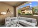 Inviting outdoor living space featuring a comfortable sectional sofa and views of the neighborhood at 20100 N 78Th Pl # 1040, Scottsdale, AZ 85255