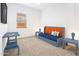 Bright and functional bedroom with neutral carpet and blue furniture at 2027 W Sleepy Ranch Rd, Phoenix, AZ 85085