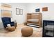 Charming Bedroom with hardwood floors, a crib, and a comfortable rocking chair at 2027 W Sleepy Ranch Rd, Phoenix, AZ 85085