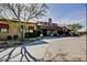 Beautiful clubhouse featuring an attractive stone tower with a covered entry at 2027 W Sleepy Ranch Rd, Phoenix, AZ 85085