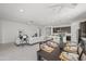 Open-concept living and dining areas lead to the kitchen, perfect for entertaining and everyday living at 2027 W Sleepy Ranch Rd, Phoenix, AZ 85085