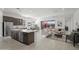 Bright open-concept living area with modern decor, tile floors, and access to a patio at 2027 W Sleepy Ranch Rd, Phoenix, AZ 85085