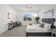 Serene main bedroom featuring a large bed, neutral decor, and bright natural light at 2027 W Sleepy Ranch Rd, Phoenix, AZ 85085