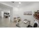 Bright home office featuring desk, white board, and decor with views to kitchen and living areas at 2027 W Sleepy Ranch Rd, Phoenix, AZ 85085