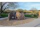 Community playground featuring a rock climbing structure and desert landscaping at 2027 W Sleepy Ranch Rd, Phoenix, AZ 85085