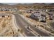Picturesque street view of a desert neighborhood with gated entrances and mountain views at 2027 W Sleepy Ranch Rd, Phoenix, AZ 85085