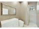 Well-lit bathroom featuring a sleek vanity, modern toilet, and glass enclosed shower at 20750 N 87Th St # 1009, Scottsdale, AZ 85255