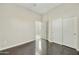 Bedroom with wood floors, ceiling fan and a closet at 20750 N 87Th St # 1009, Scottsdale, AZ 85255