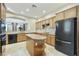 Spacious kitchen with granite counters, center island, and stainless steel appliances at 20750 N 87Th St # 1009, Scottsdale, AZ 85255