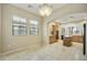 Open kitchen with large island, granite counters, and plenty of natural light at 20750 N 87Th St # 1009, Scottsdale, AZ 85255