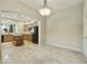 Modern kitchen with large island and stainless steel appliances with adjacent dining area at 20750 N 87Th St # 1009, Scottsdale, AZ 85255