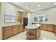 Bright kitchen with granite countertops, large island, and stainless steel appliances at 20750 N 87Th St # 1009, Scottsdale, AZ 85255